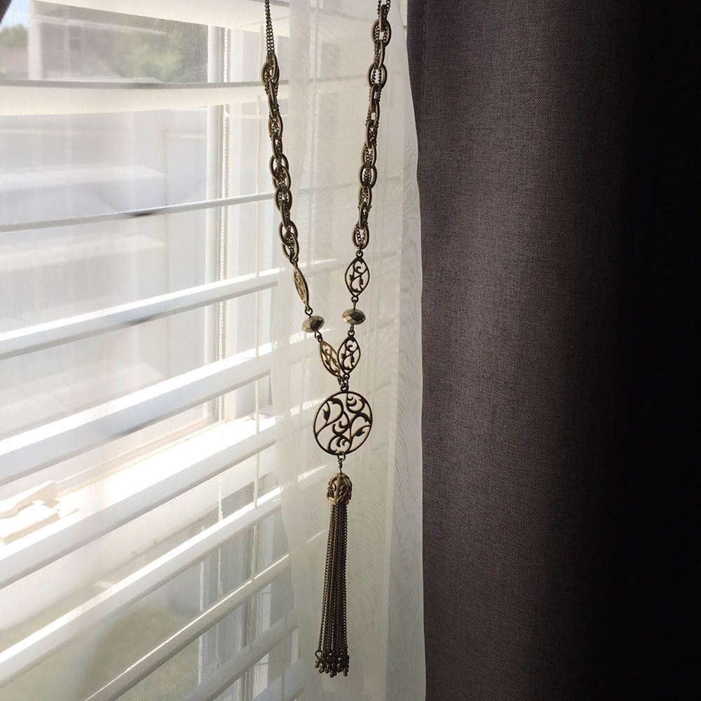 Long Gold Colored Necklace